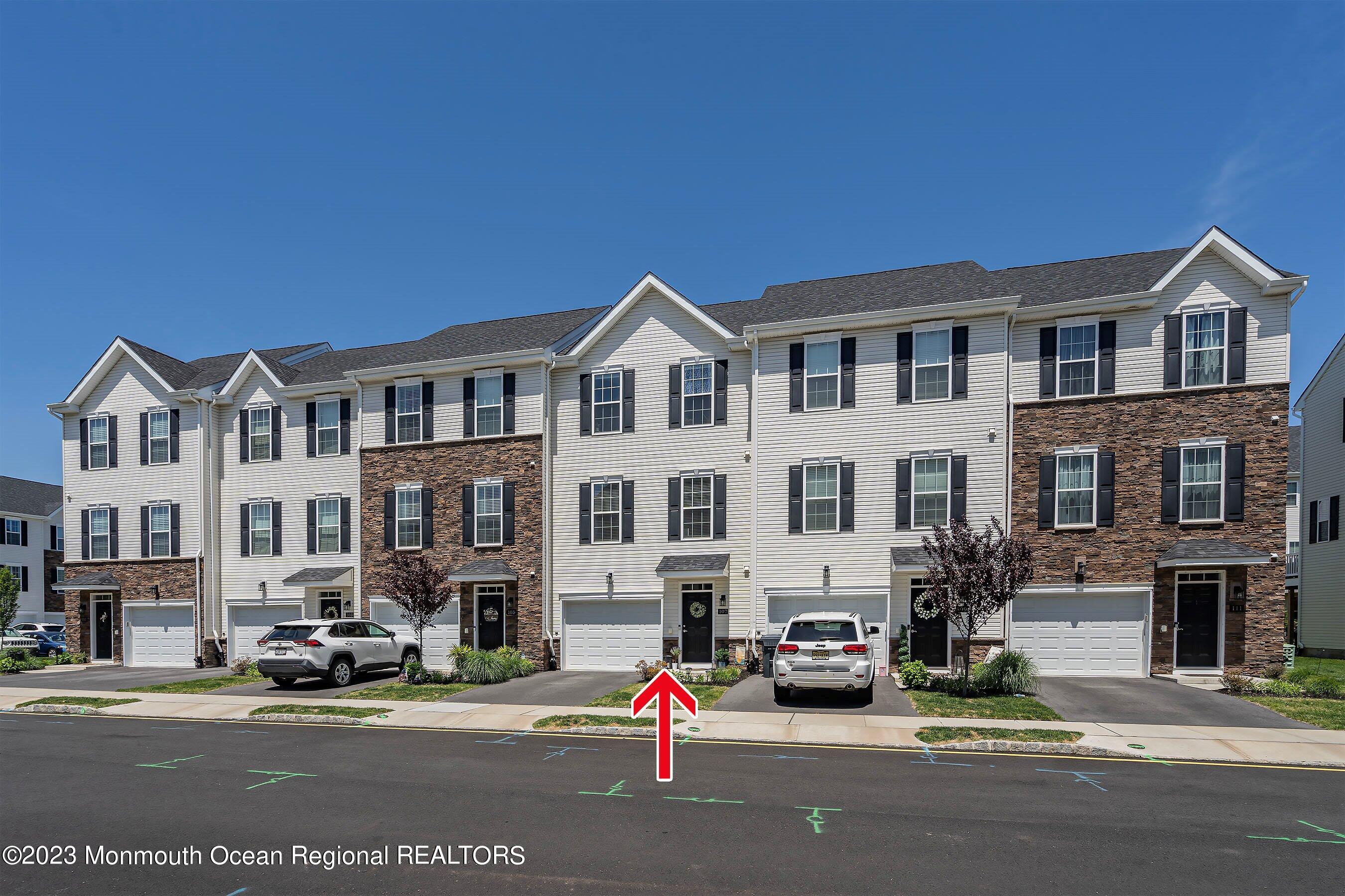 107 Revival Road Brick, NJ 08723 - Photo 7 of 41 08-Front Right with Arrow 1