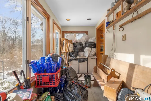a room with furniture and a window