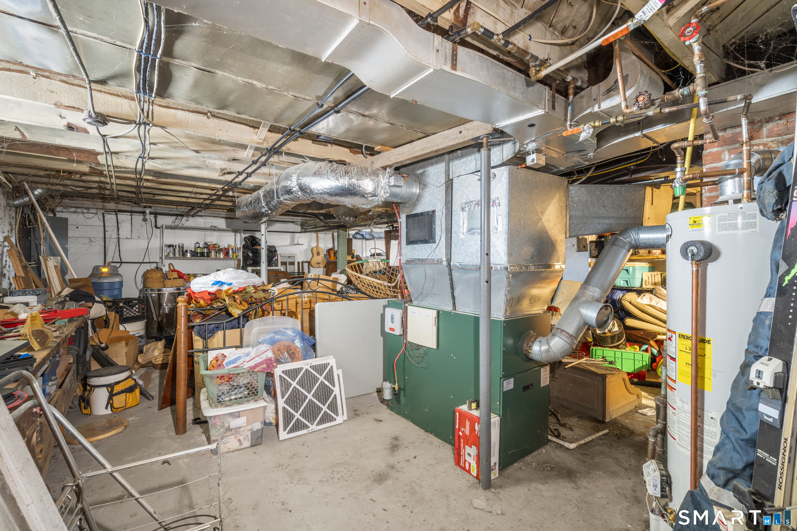 28 Reservoir Street Bethel, CT 06801 - Photo 31 of 40 a view of a storage room with a lot of stuff