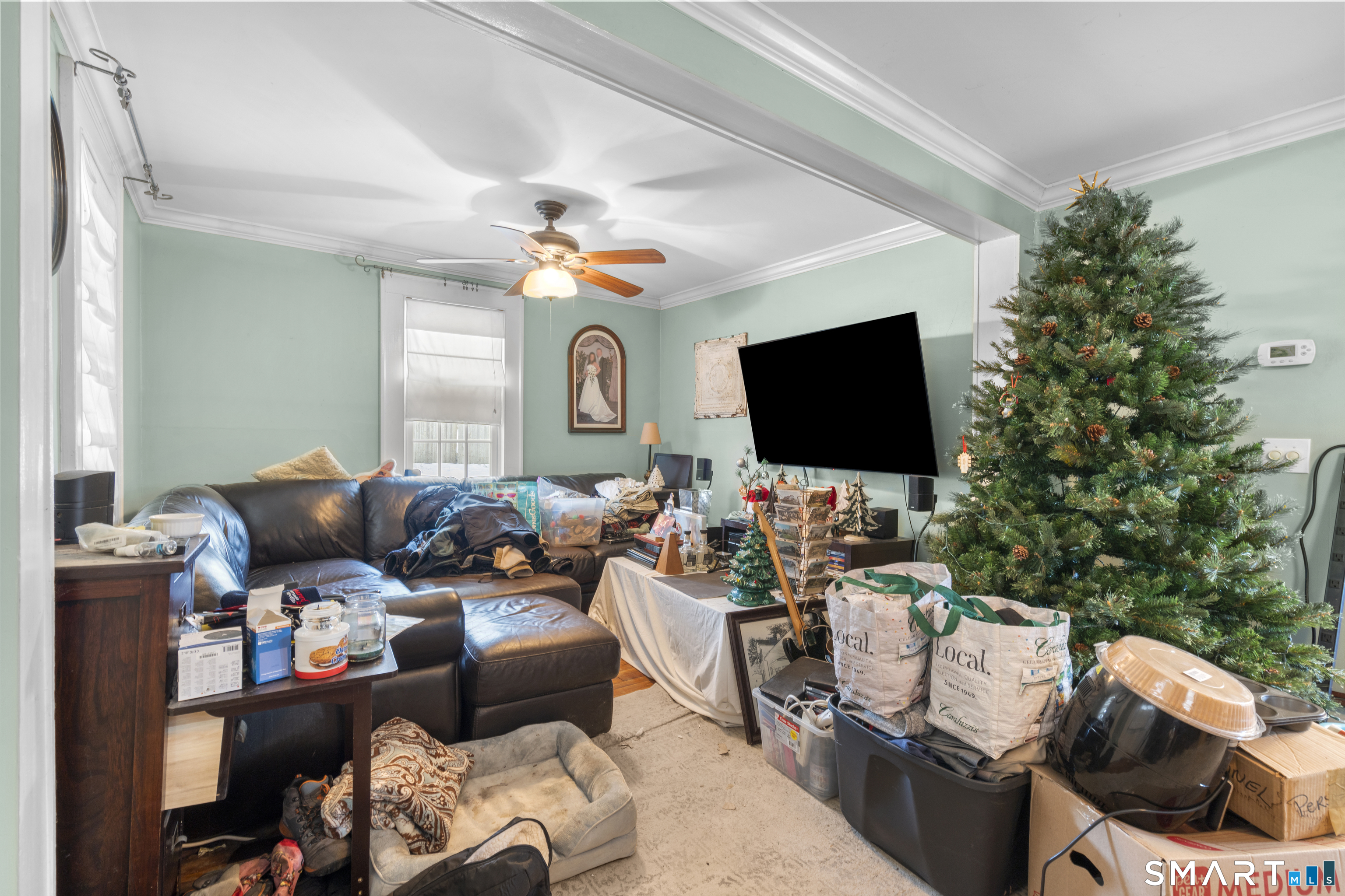 28 Reservoir Street Bethel, CT 06801 - Photo 8 of 40 a outdoor living space with furniture and a flat screen tv
