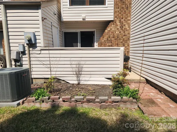 a view of a back yard of the house