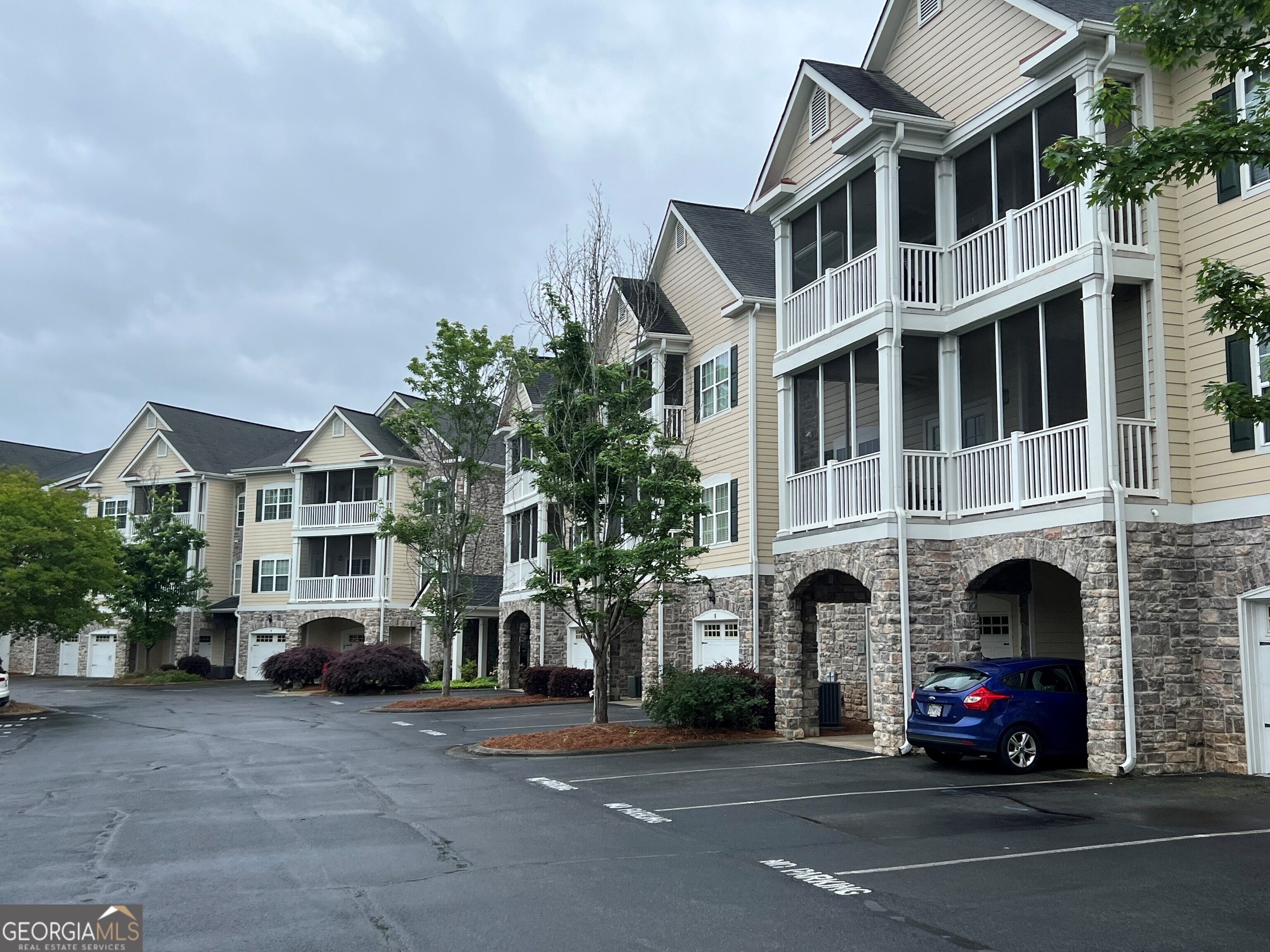 3015 Village Boulevard Southeast Rome, GA 30161 - Photo 1 of 1 a view of building with cars parked