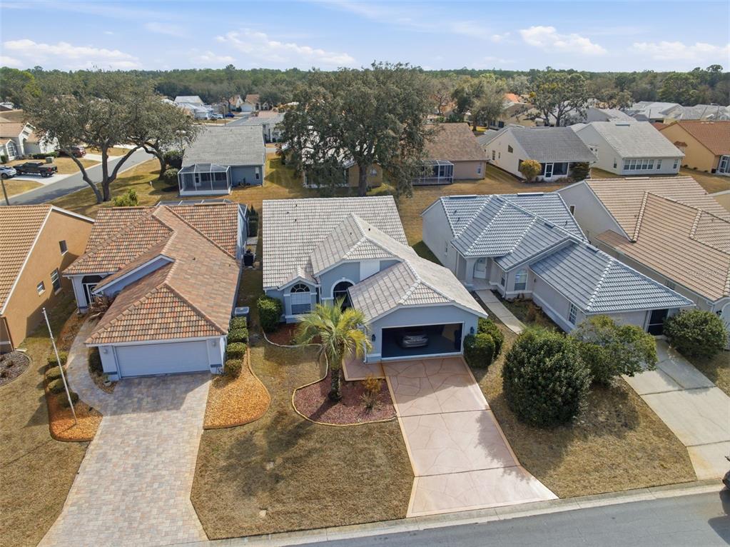 9376 French Quarters Circle Weeki Wachee, FL 34613 - Photo 24 of 43 an aerial view of a house with a yard