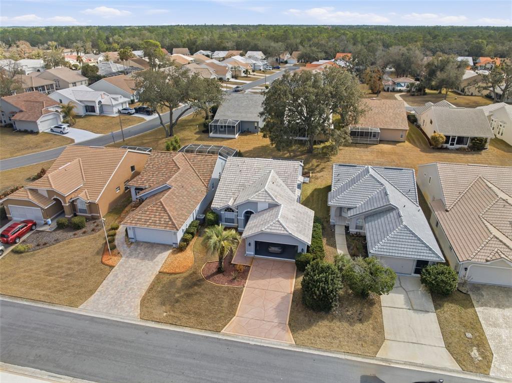 9376 French Quarters Circle Weeki Wachee, FL 34613 - Photo 25 of 43 an aerial view of residential houses with outdoor space