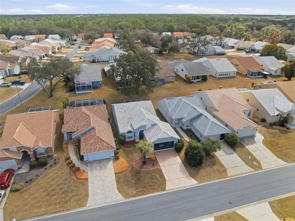 9376 French Quarters Circle Weeki Wachee, FL 34613 - Photo 26 of 43 an aerial view of residential houses with outdoor space