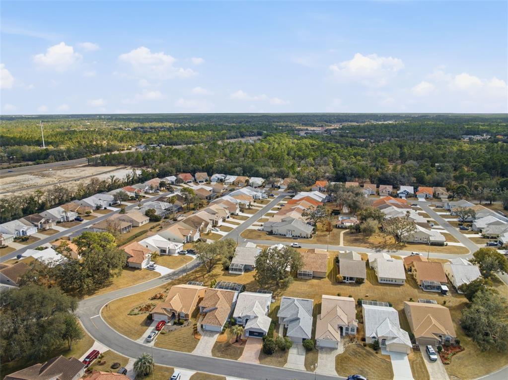 9376 French Quarters Circle Weeki Wachee, FL 34613 - Photo 32 of 43 an aerial view of a city