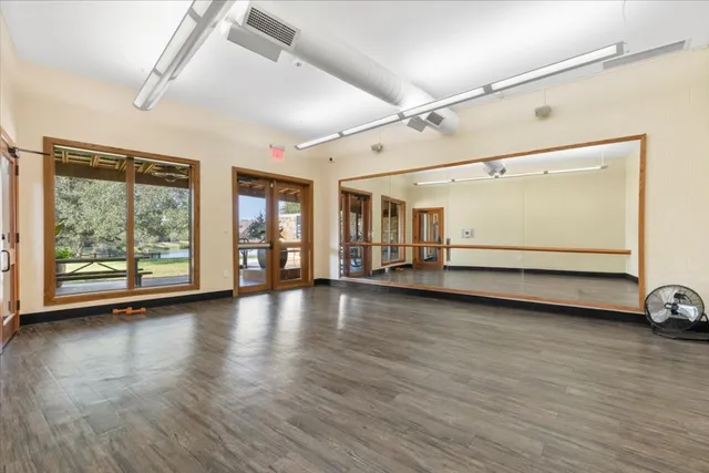 a view of a large window with wooden floor