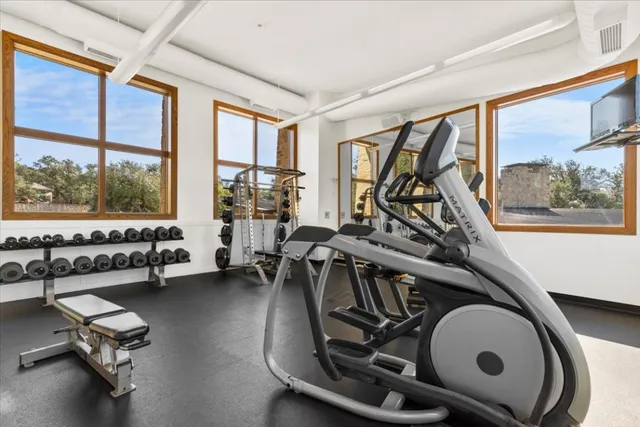 a view of a room with gym equipment