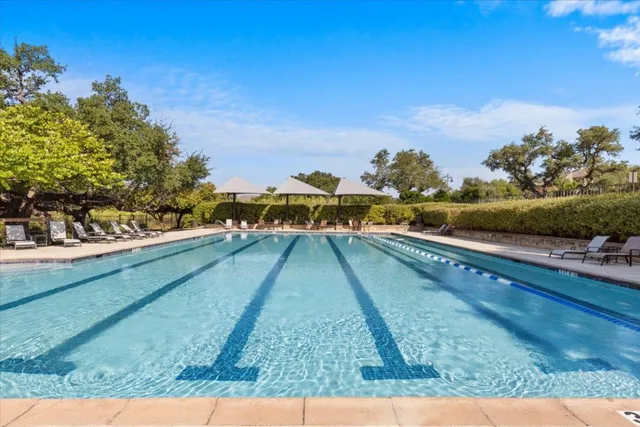 a view of an outdoor swimming pool