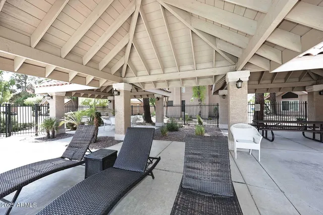 a view of a park with large trees