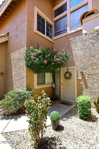 a house with a flower garden