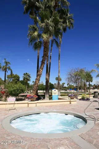 a view of a garden with a lake view
