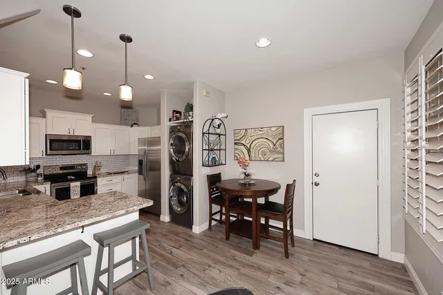 a kitchen with a stove microwave and refrigerator
