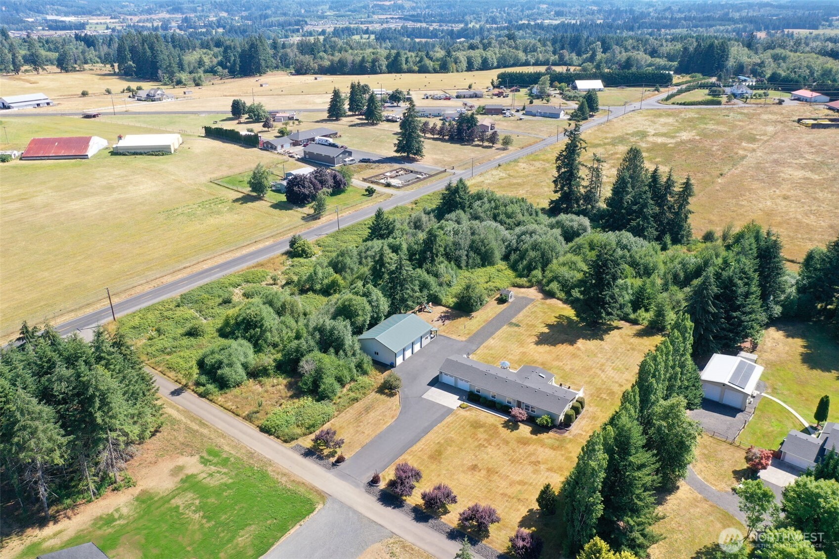 109 Bowers Road Chehalis, WA 98532 - Photo 2 of 38 an aerial view of a house with lake view