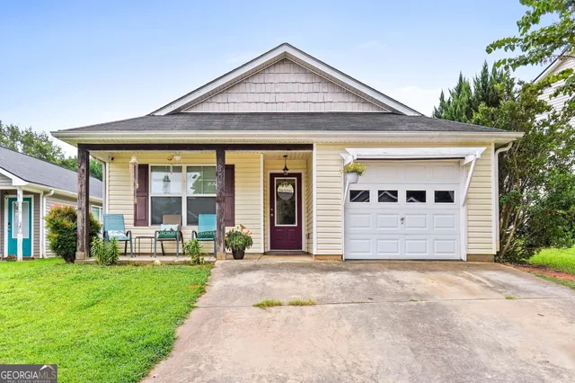 front view of a house with a yard