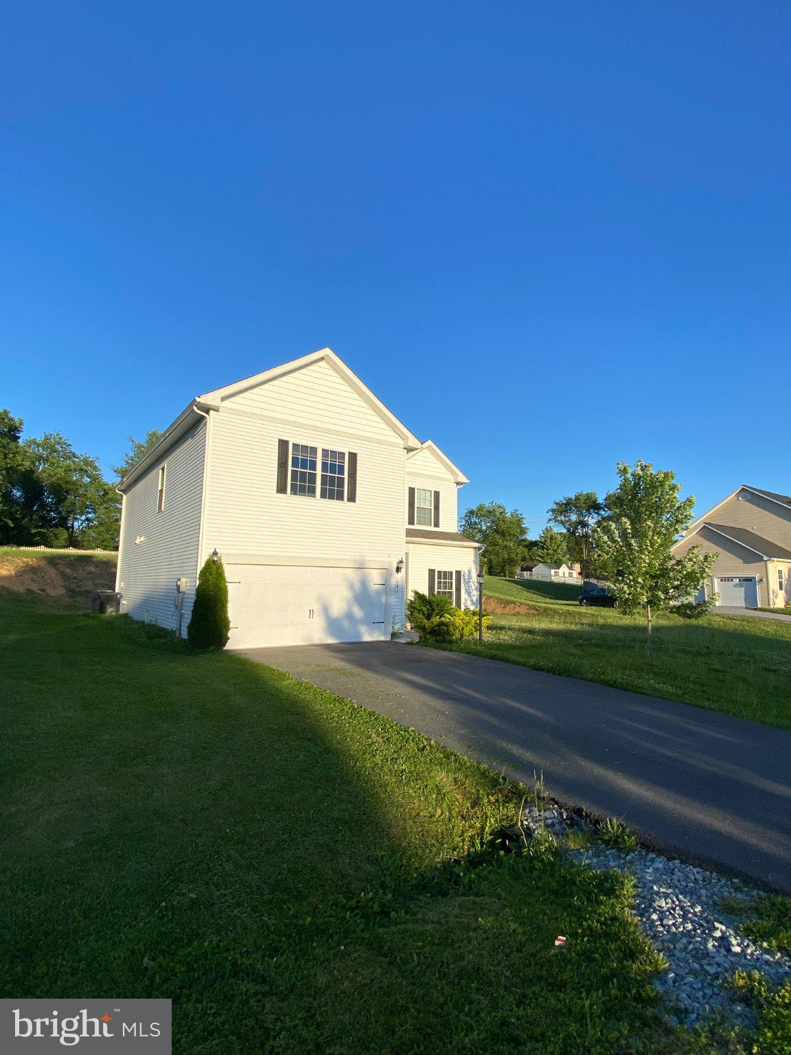 697 Rivanna Run Falling Waters, WV 25419 - Photo 2 of 44 a view of a house with a yard