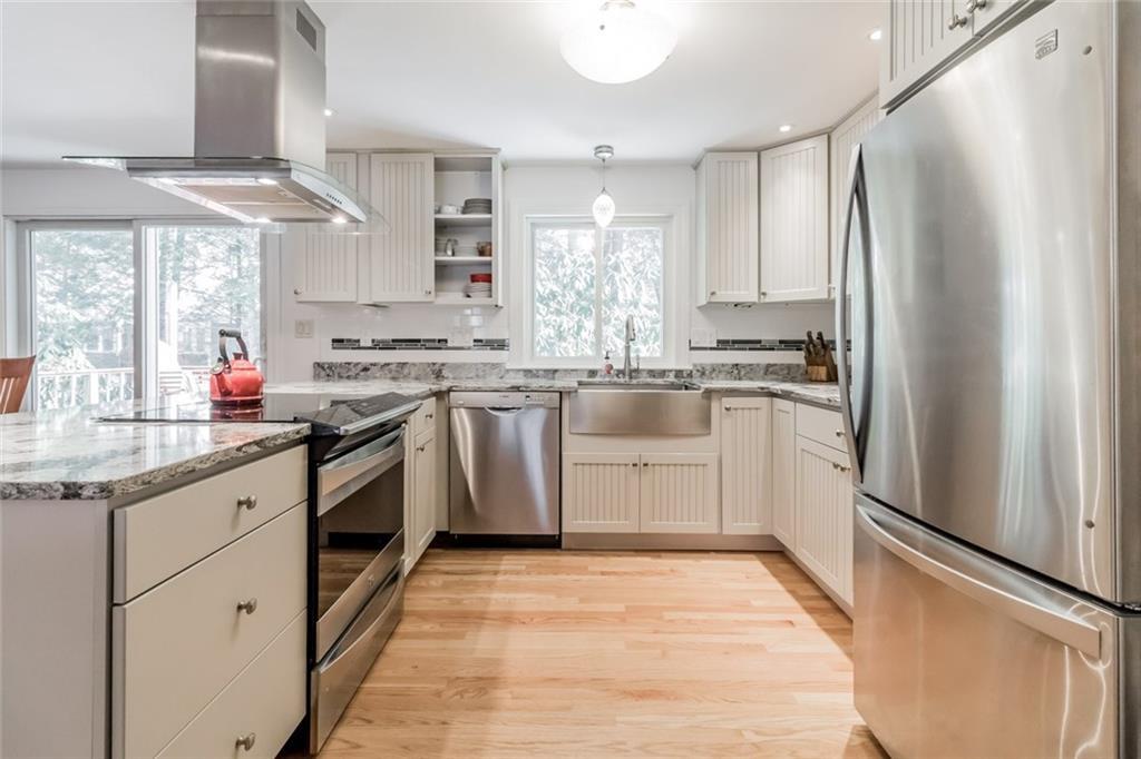 65 Applegate Lane, Unit 65 Falmouth, ME 04105 - Photo 10 of 35 The cabinet door was removed in the...