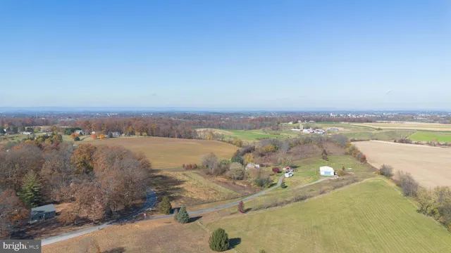 a view of an ocean and city