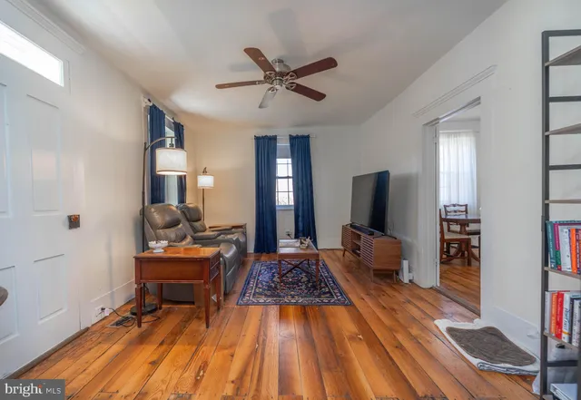a kitchen with stainless steel appliances granite countertop a stove and cabinets