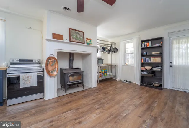 a bedroom with bed and window