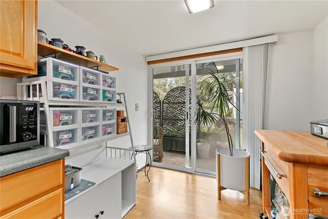 a view of a livingroom with furniture and staircase