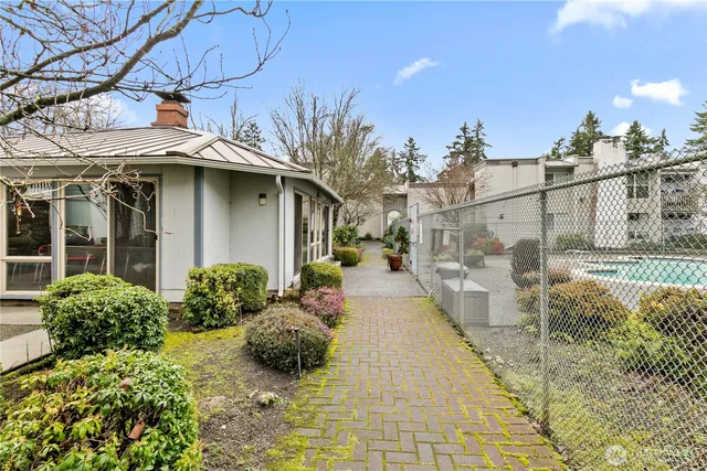 a view of a lake with a yard