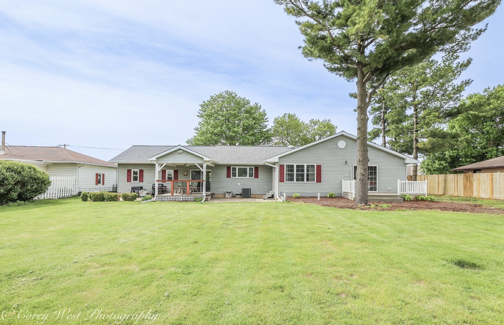 533 Bethany Road Sycamore, IL 60178 - Photo 38 of 44 a front view of a house with a garden and trees
