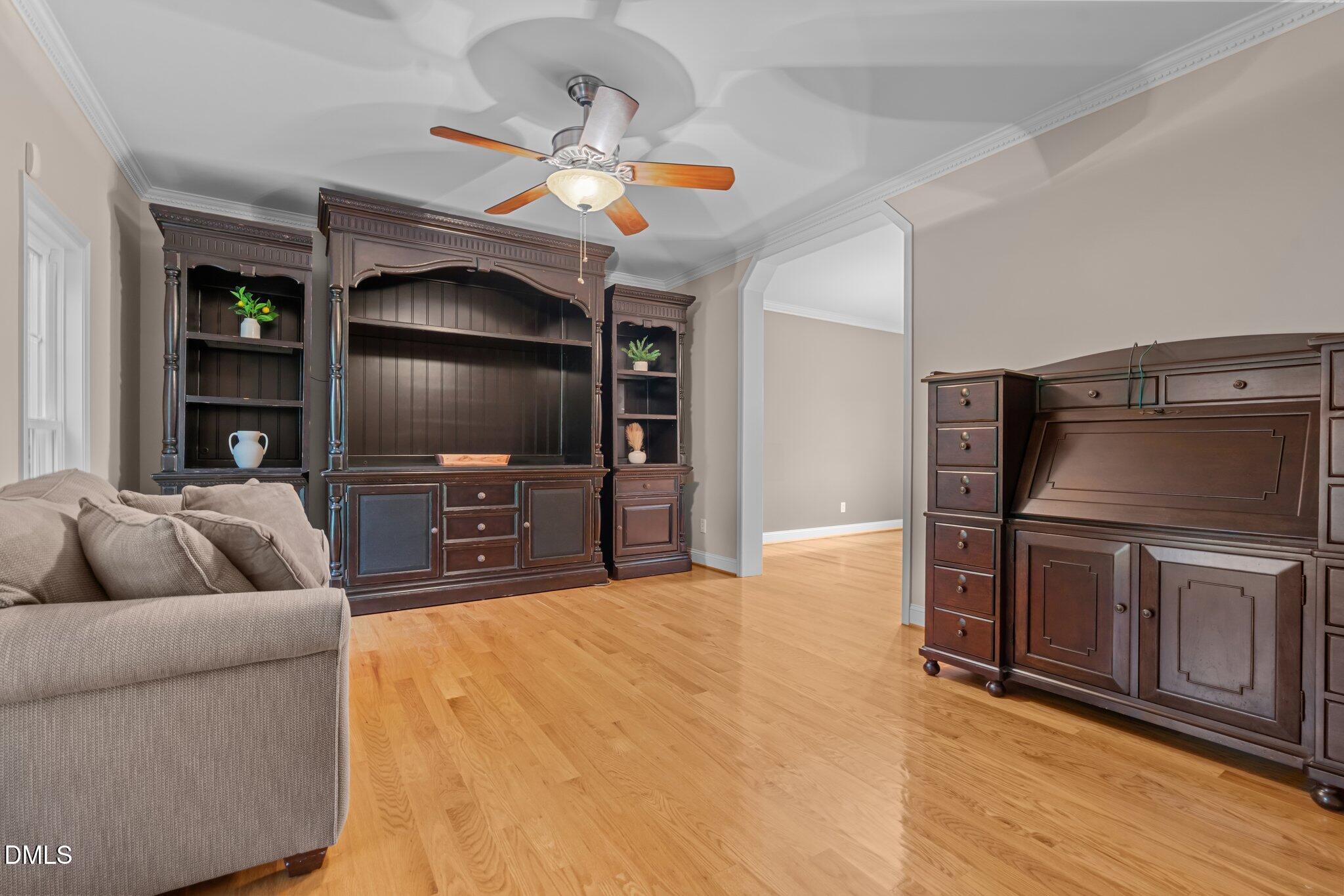431 Patterson Ridge Lane Sanford, NC 27330 - Photo 7 of 29 a living room with furniture and a flat screen tv