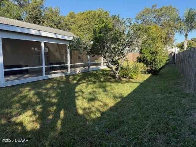 a view of swimming pool with a yard