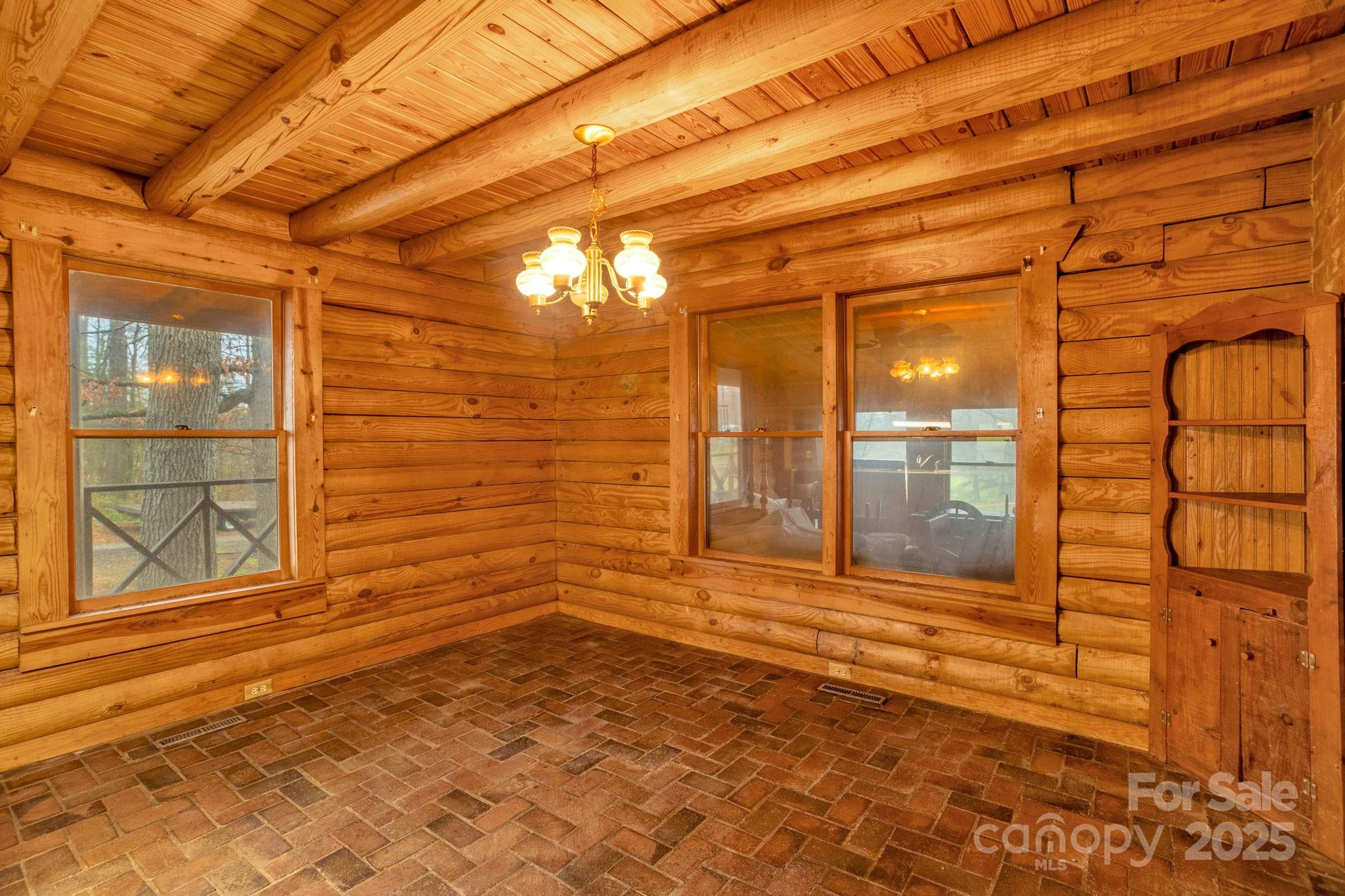 723 Hill Everhart Road Lexington, NC 27295 - Photo 14 of 48 a view of empty room with windows
