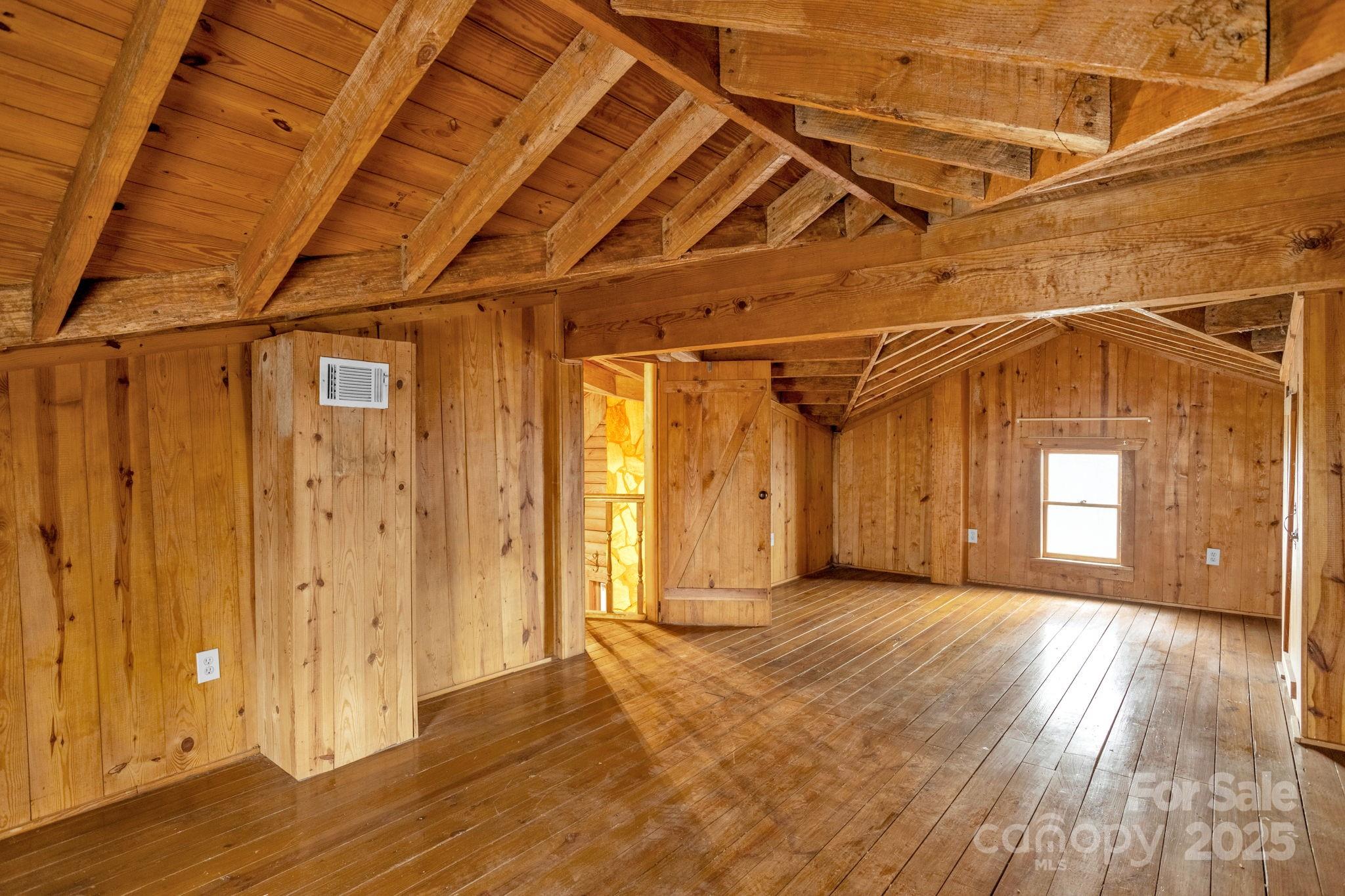 723 Hill Everhart Road Lexington, NC 27295 - Photo 20 of 48 a view of a room with wooden walls