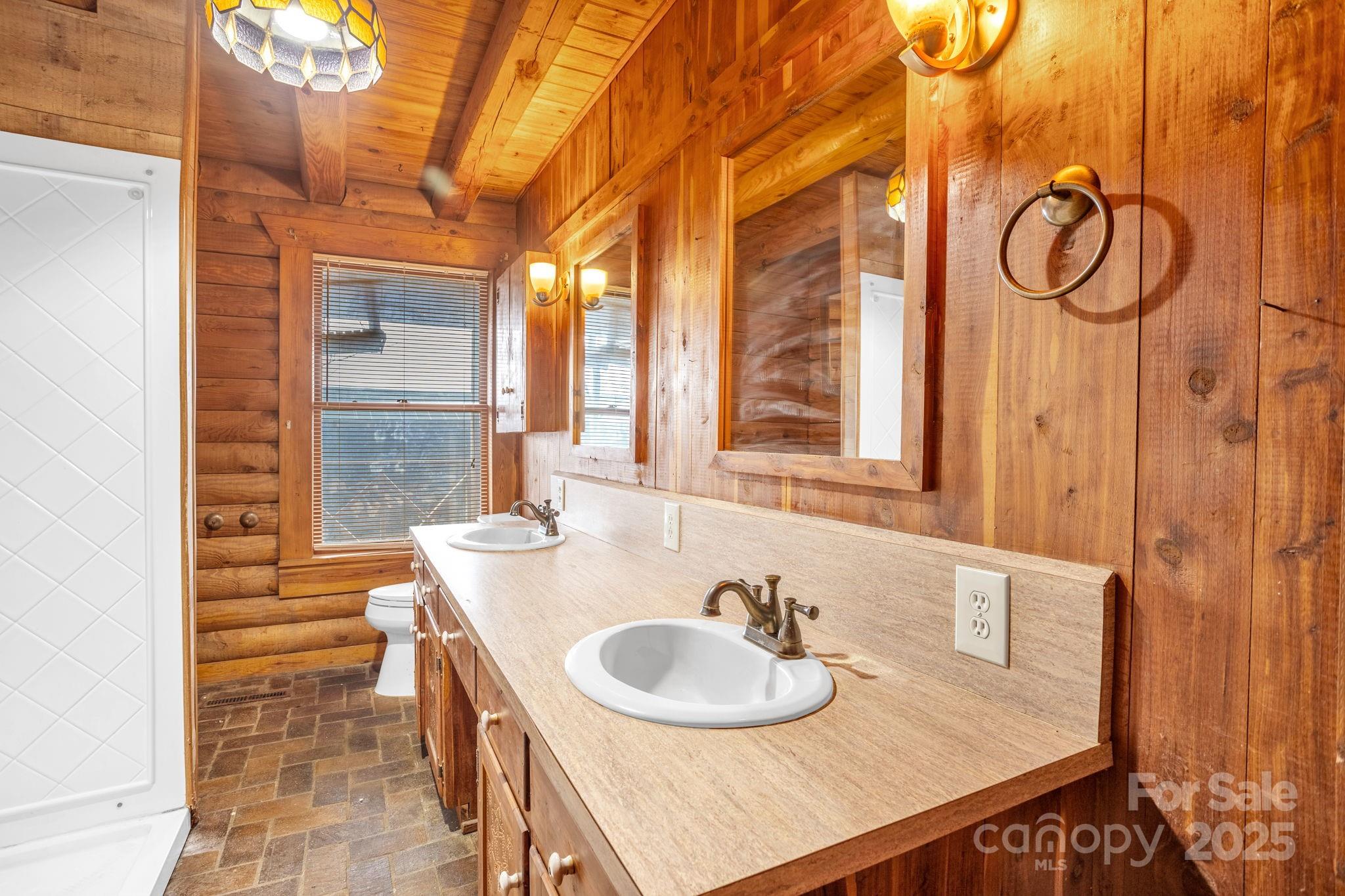 723 Hill Everhart Road Lexington, NC 27295 - Photo 21 of 48 a bathroom with a sink and a mirror