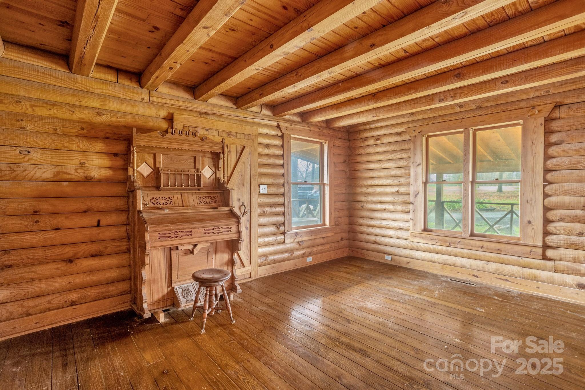 723 Hill Everhart Road Lexington, NC 27295 - Photo 24 of 48 a view of empty room with wooden floor and fan