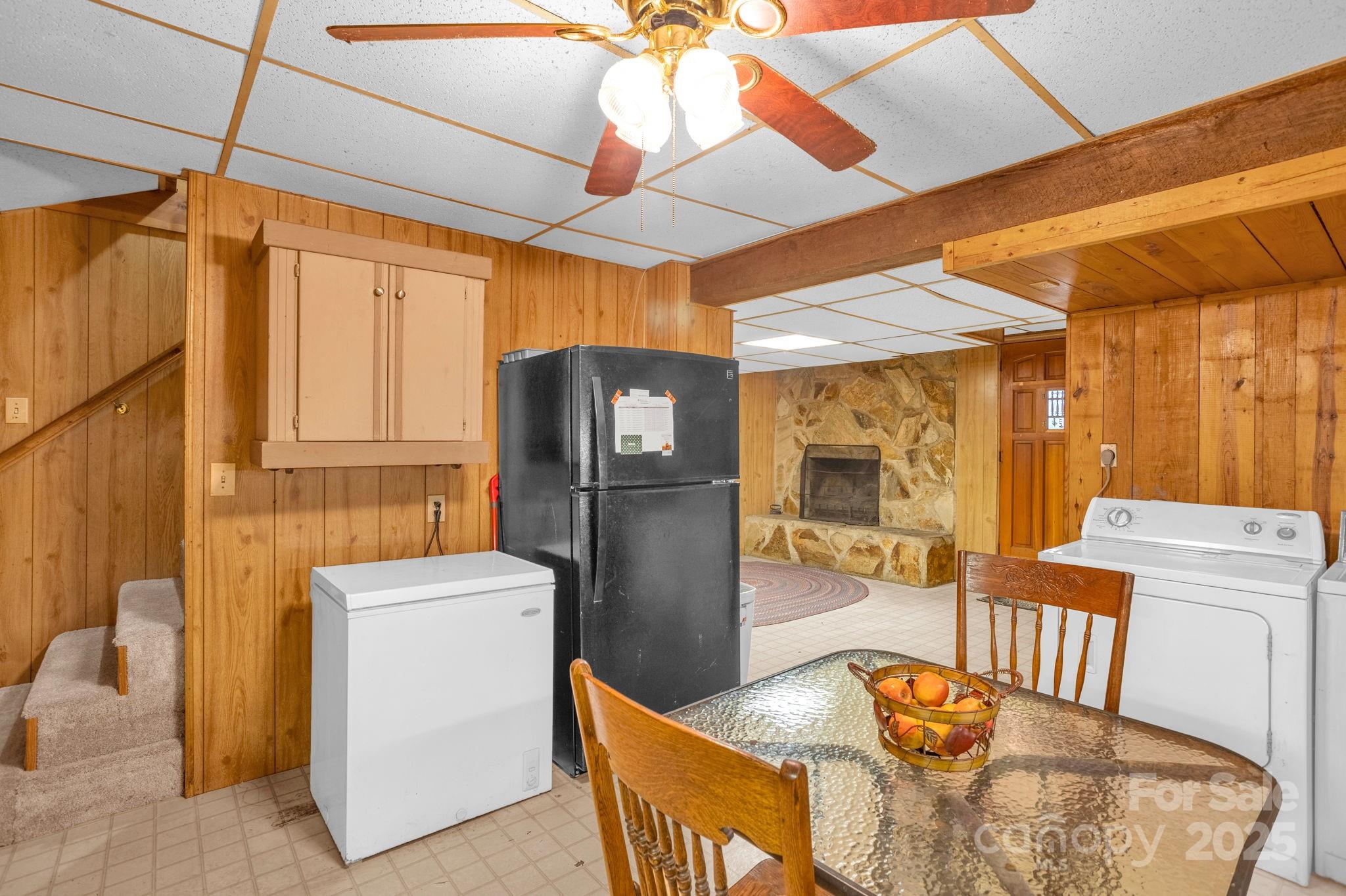 723 Hill Everhart Road Lexington, NC 27295 - Photo 28 of 48 a kitchen with stainless steel appliances wooden floor dining table and chairs