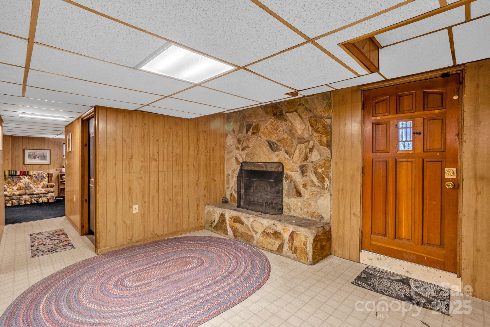 723 Hill Everhart Road Lexington, NC 27295 - Photo 30 of 48 a room with furniture and a flat screen tv