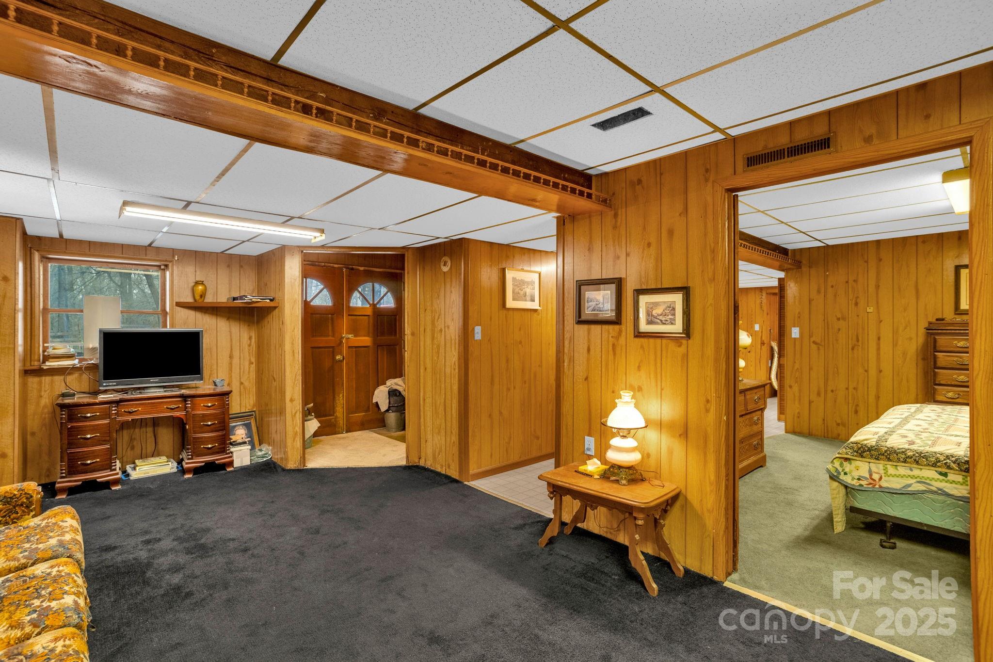 723 Hill Everhart Road Lexington, NC 27295 - Photo 35 of 48 a bedroom with furniture and a window
