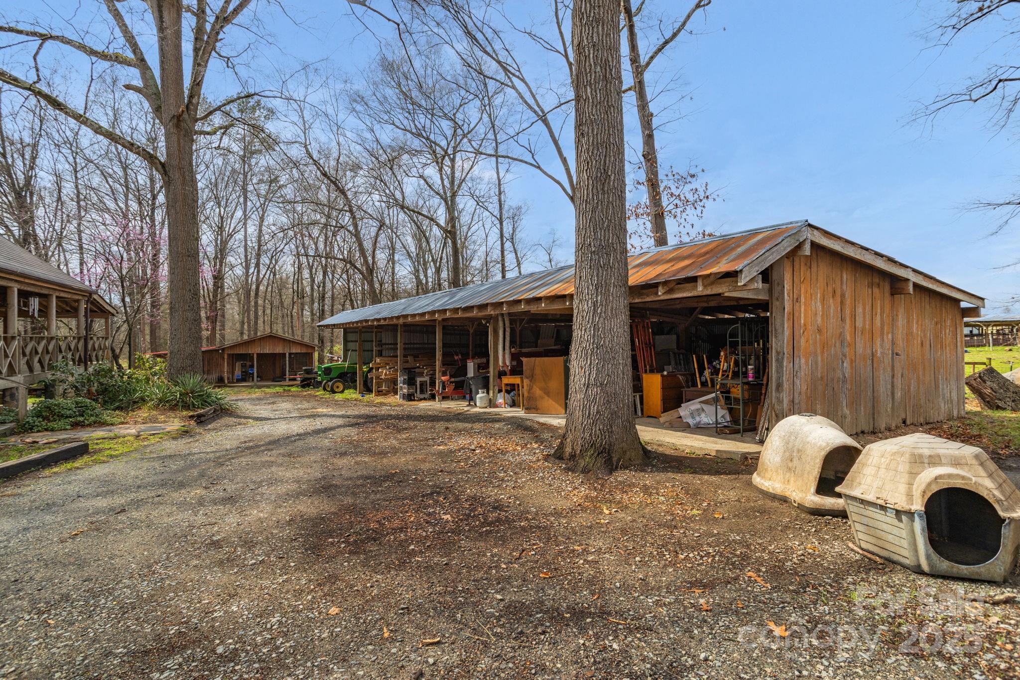 723 Hill Everhart Road Lexington, NC 27295 - Photo 37 of 48 a view of a house with backyard and sitting area