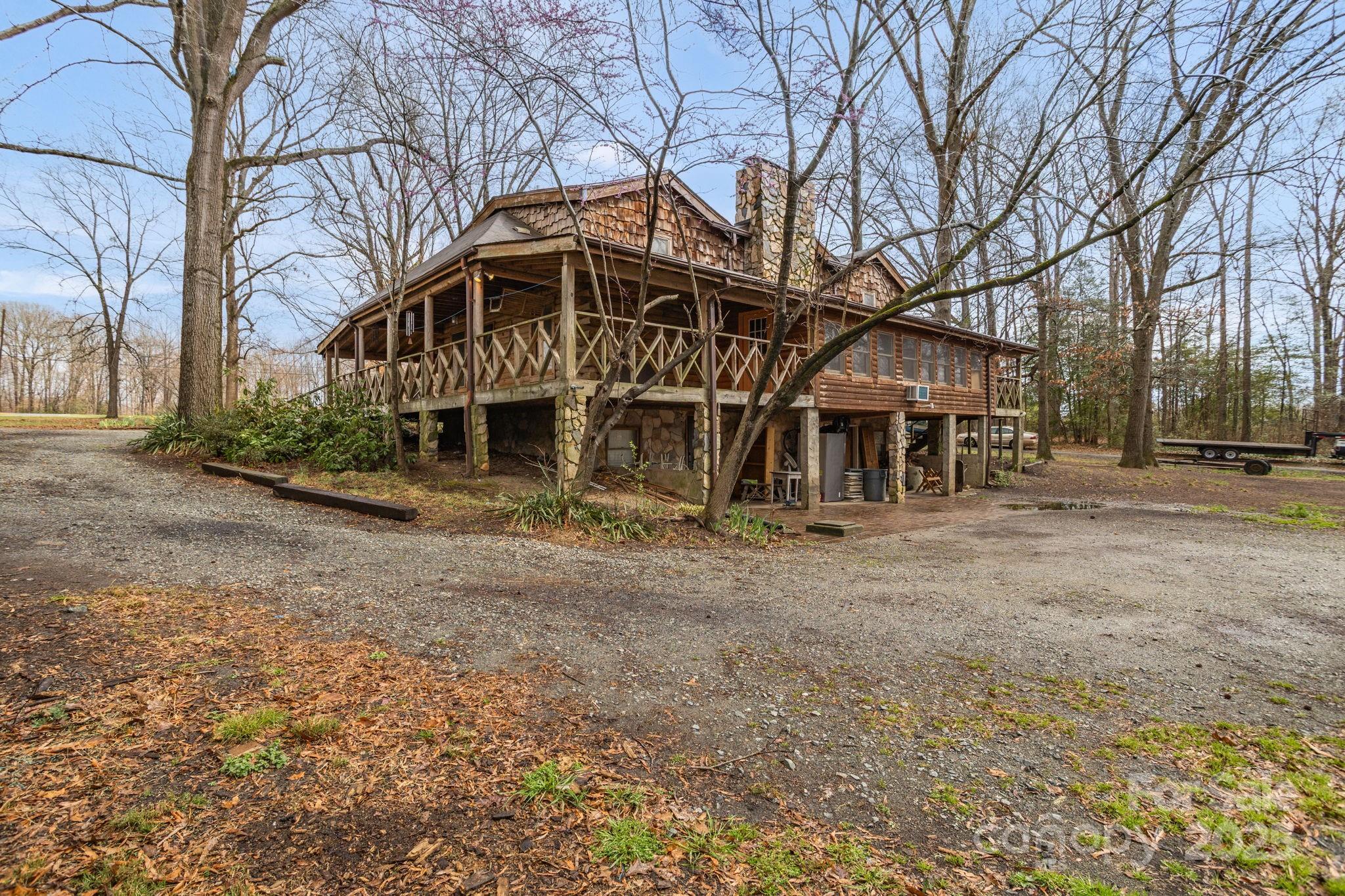 723 Hill Everhart Road Lexington, NC 27295 - Photo 39 of 48 a view of a house with a yard and tree s