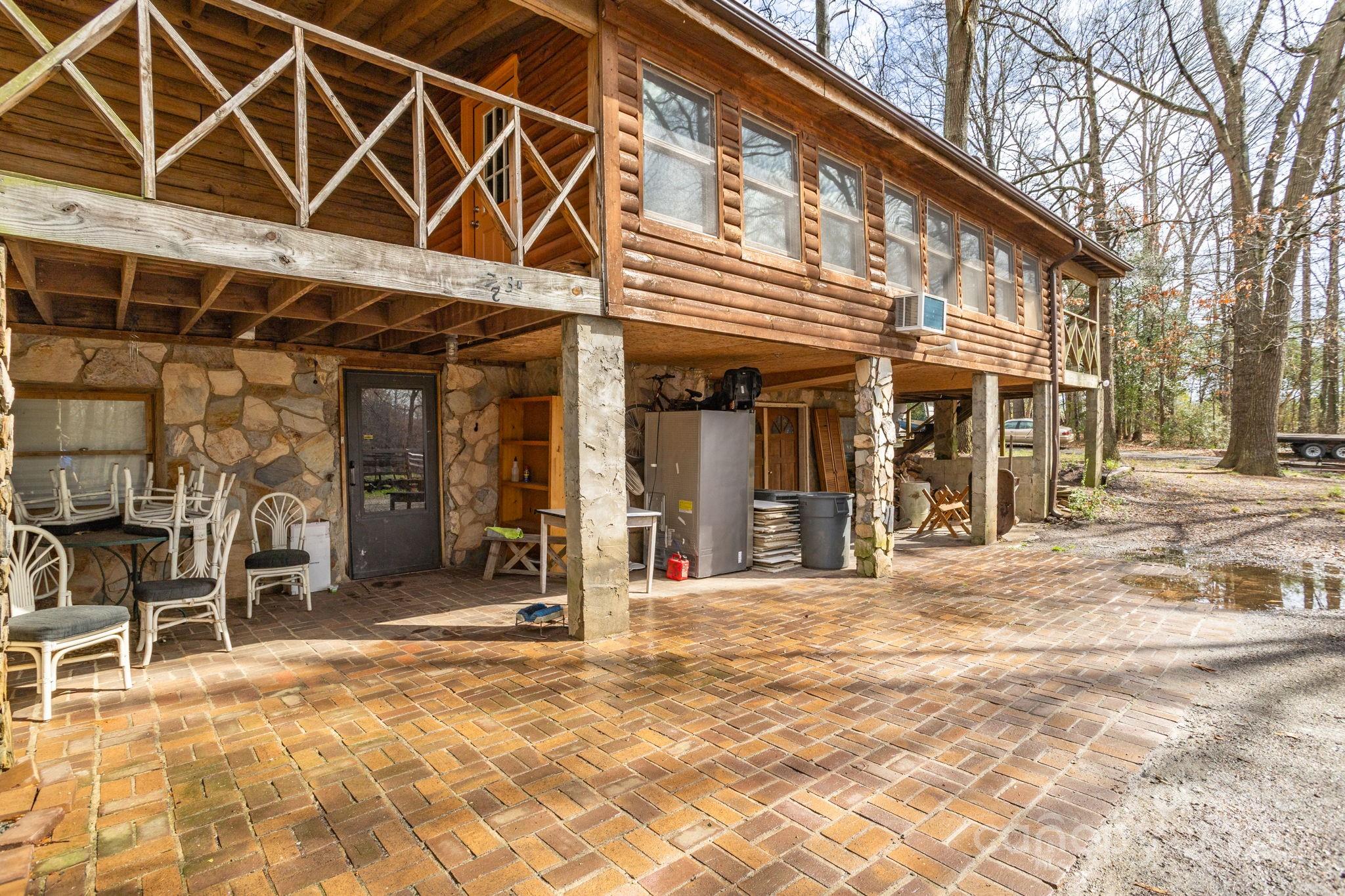 723 Hill Everhart Road Lexington, NC 27295 - Photo 40 of 48 a view of a building with a patio