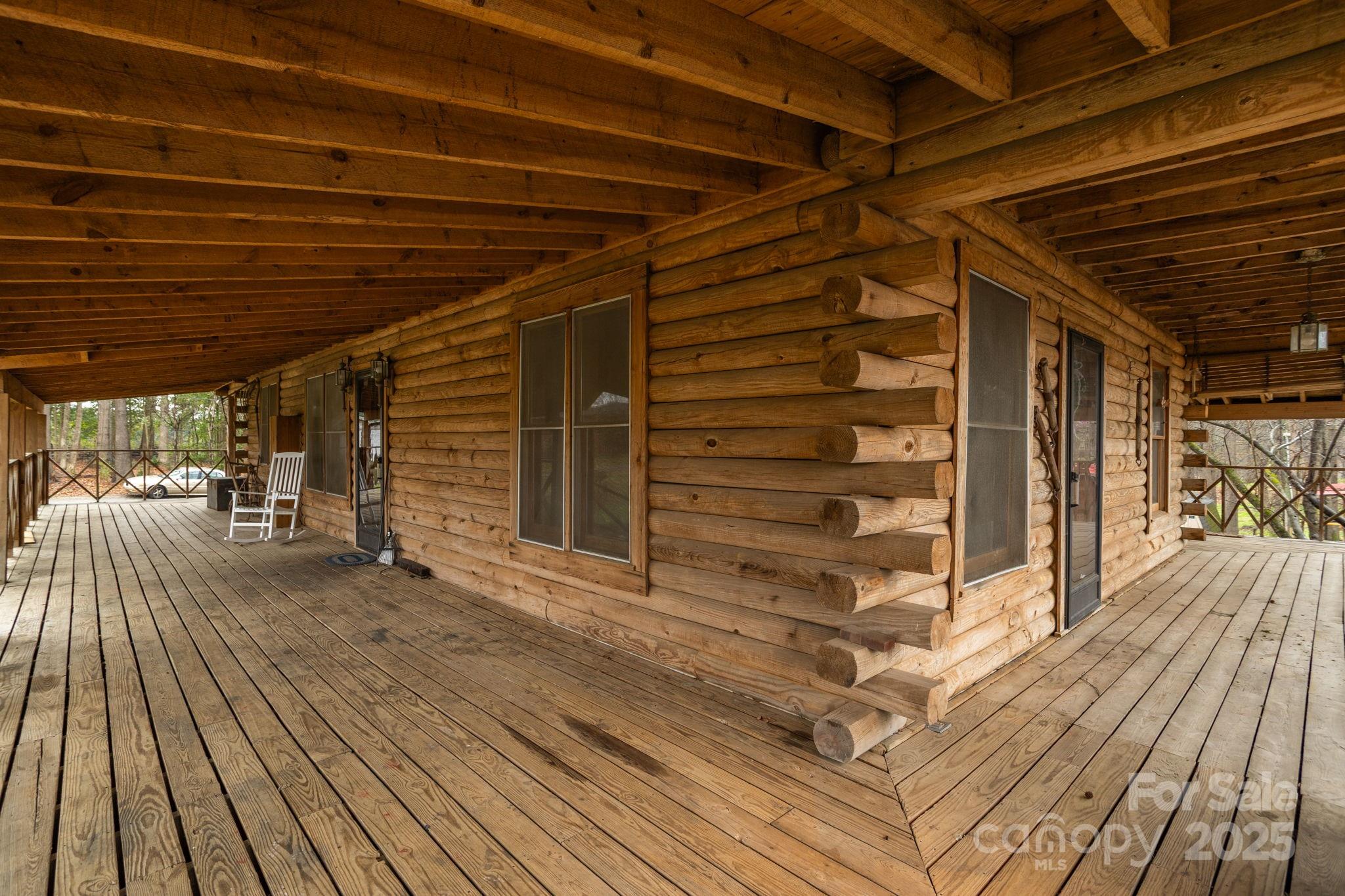 723 Hill Everhart Road Lexington, NC 27295 - Photo 4 of 48 a view of a balcony with wooden floor