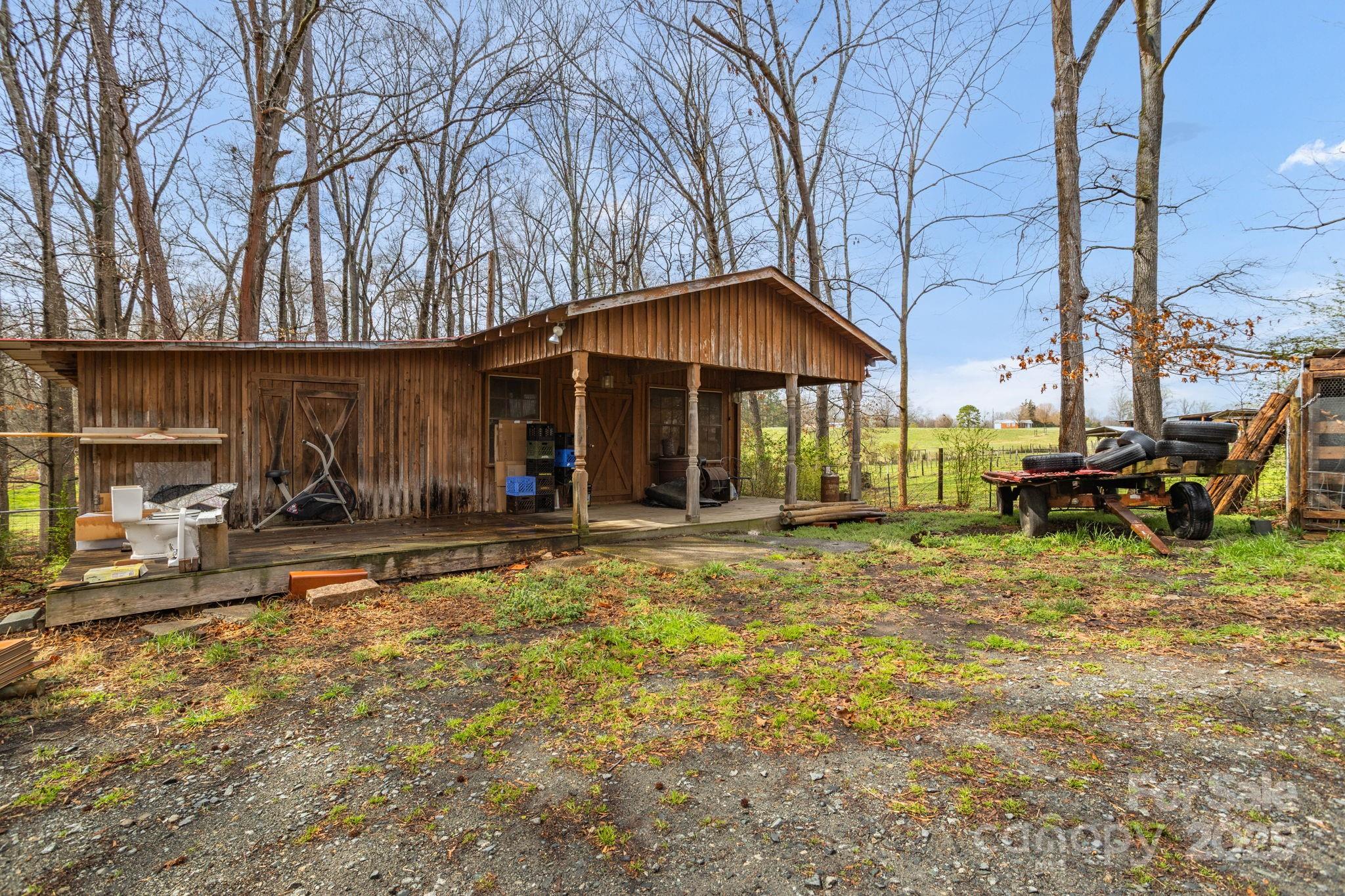 723 Hill Everhart Road Lexington, NC 27295 - Photo 43 of 48 a view of a house with backyard and sitting area