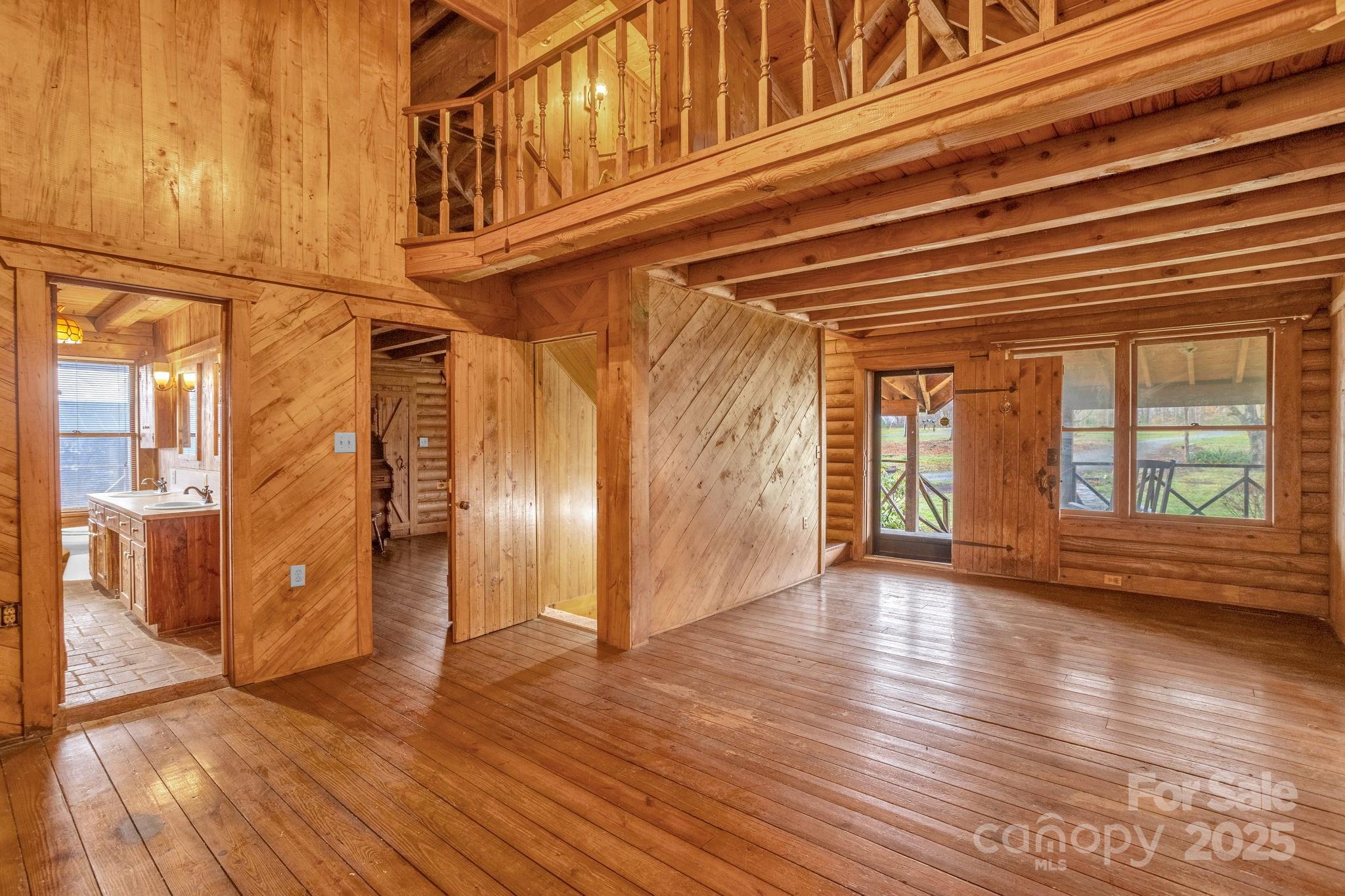 723 Hill Everhart Road Lexington, NC 27295 - Photo 8 of 48 a view of an entryway with wooden floor and a window