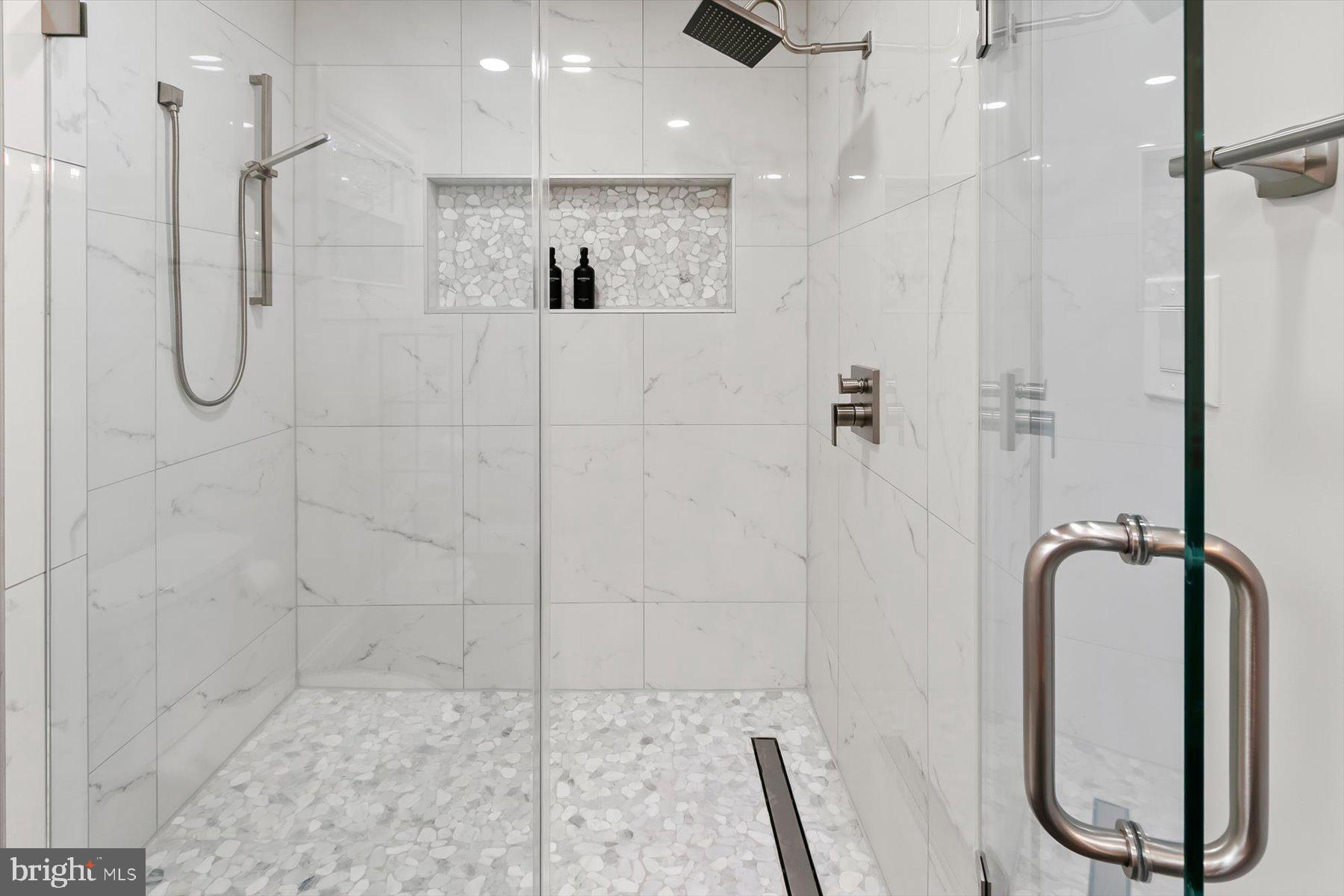 3650 Alton Place Northwest Washington, DC 20008 - Photo 15 of 31 Glass-enclosed walk in shower of the primary bath