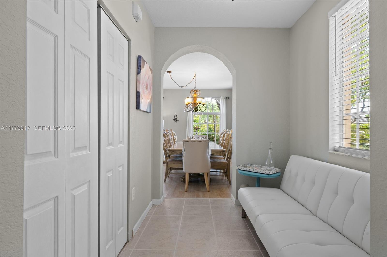 13990 Southwest 274th Terrace Homestead, FL 33032 - Photo 16 of 60 a living room with furniture and a window