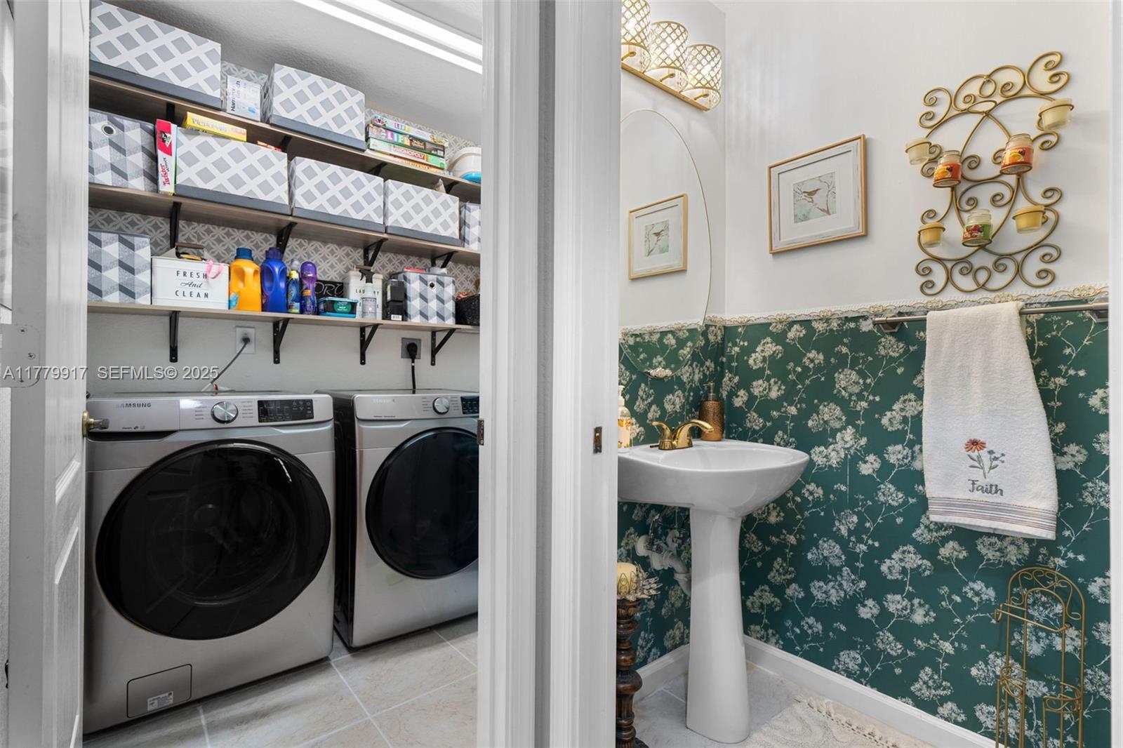 13990 Southwest 274th Terrace Homestead, FL 33032 - Photo 25 of 60 a view of a hallway with washer and dryer