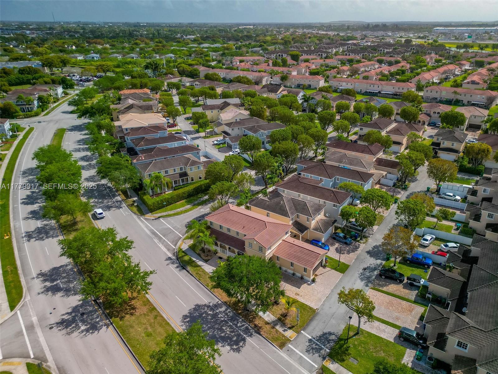 13990 Southwest 274th Terrace Homestead, FL 33032 - Photo 48 of 60 an aerial view of residential houses with outdoor space
