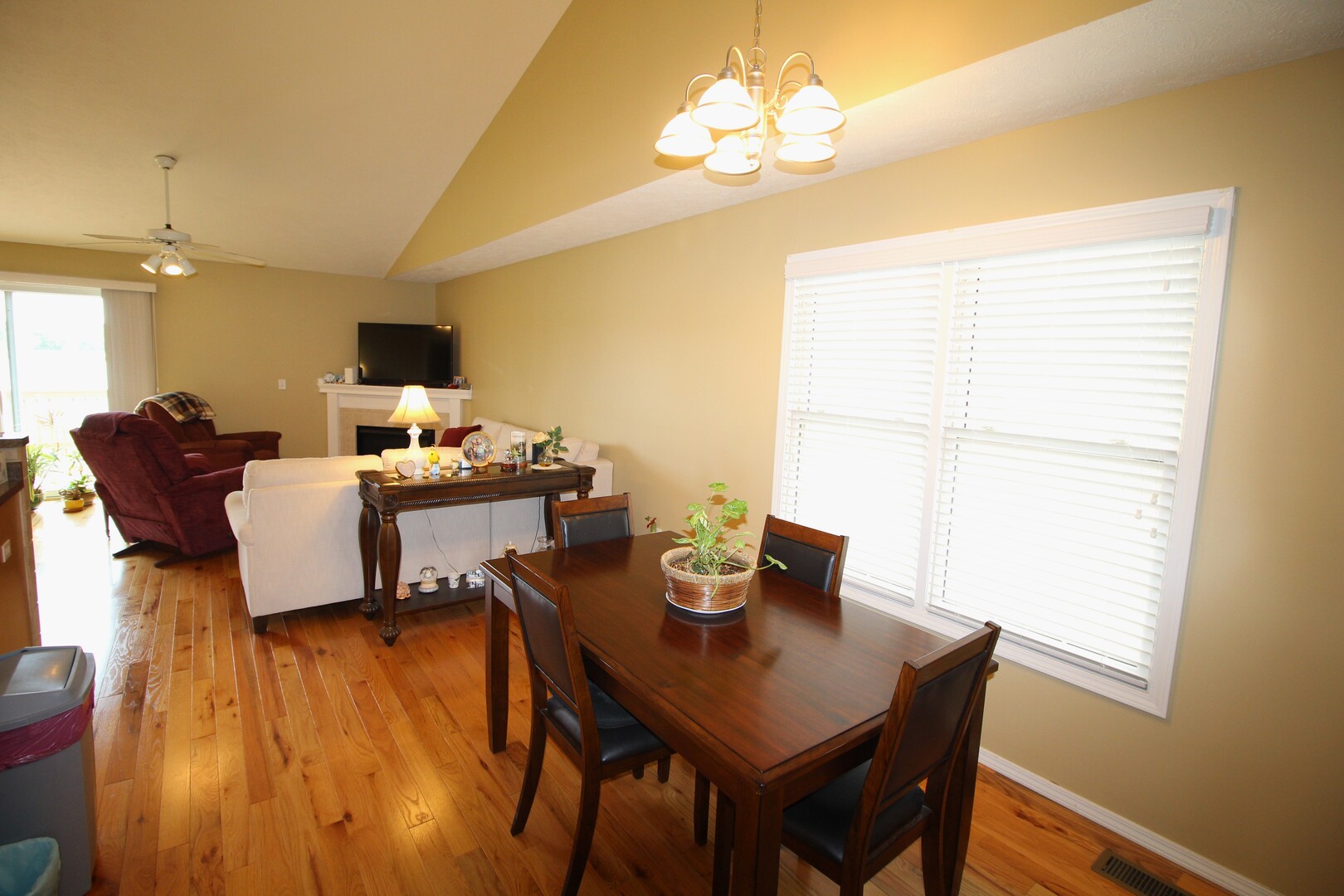 25 Oak Park Road Bloomington, IL 61701 - Photo 6 of 28 a view of a dining room with furniture and wooden floor