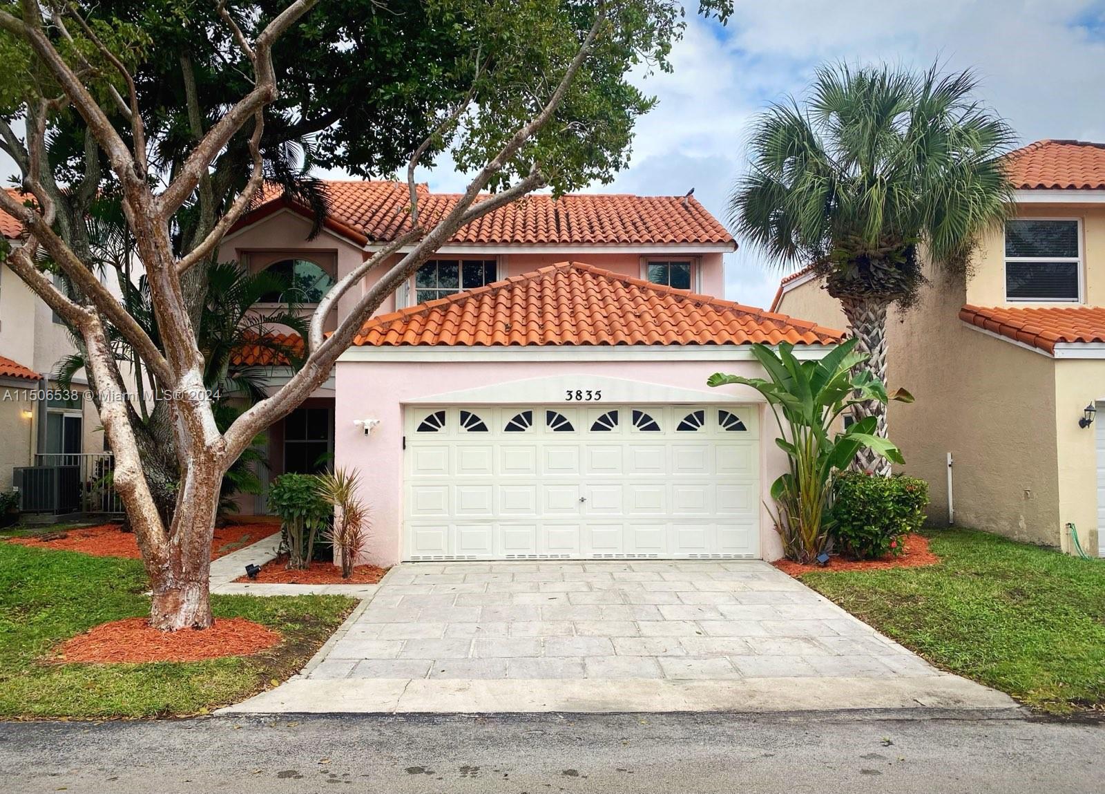 3835 Lombardy Street Hollywood, FL 33021 - Photo 1 of 20 a sign on the side of a building