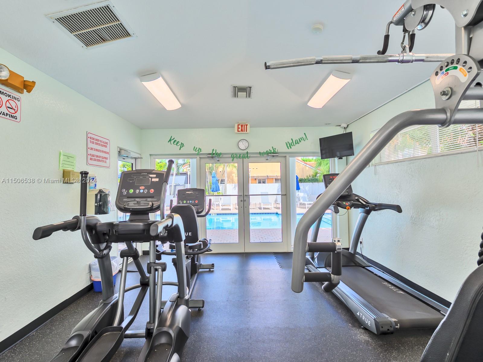 3835 Lombardy Street Hollywood, FL 33021 - Photo 17 of 20 a view of a room with gym equipment
