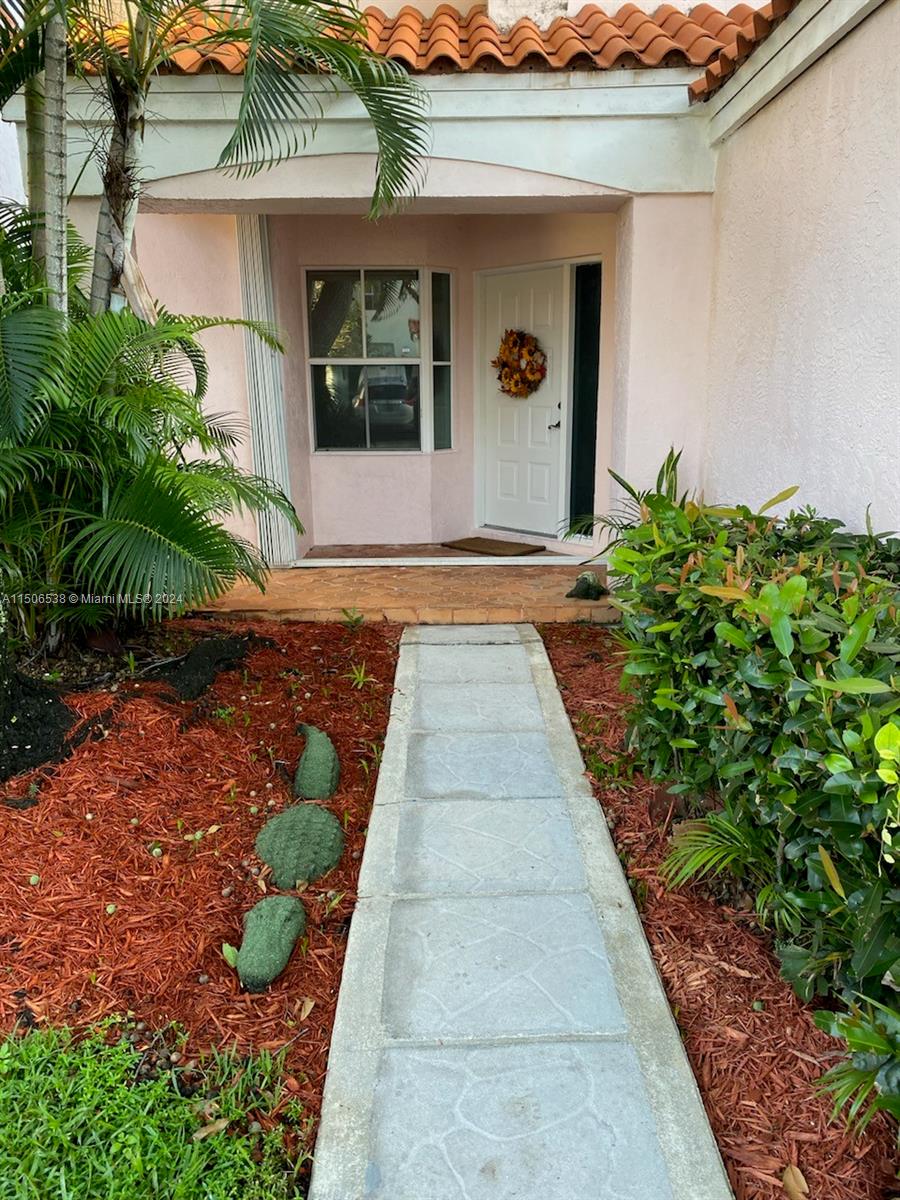 3835 Lombardy Street Hollywood, FL 33021 - Photo 6 of 20 a front view of a house